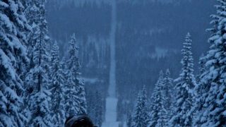 Riding a snowmobile across the Norwegian-Swedish border