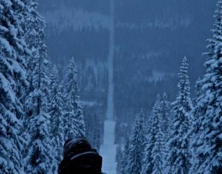 Riding a snowmobile across the Norwegian-Swedish border